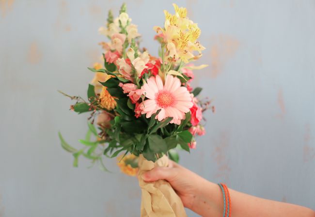 holding flowers