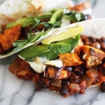 Maple chilli roast sweet potato and black bean tacos