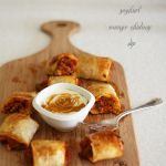 Spicy turkey and vegetable sausage rolls with chutney and cheese
