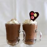 Valentines Day chocolate mousse pie with chocolate hearts
